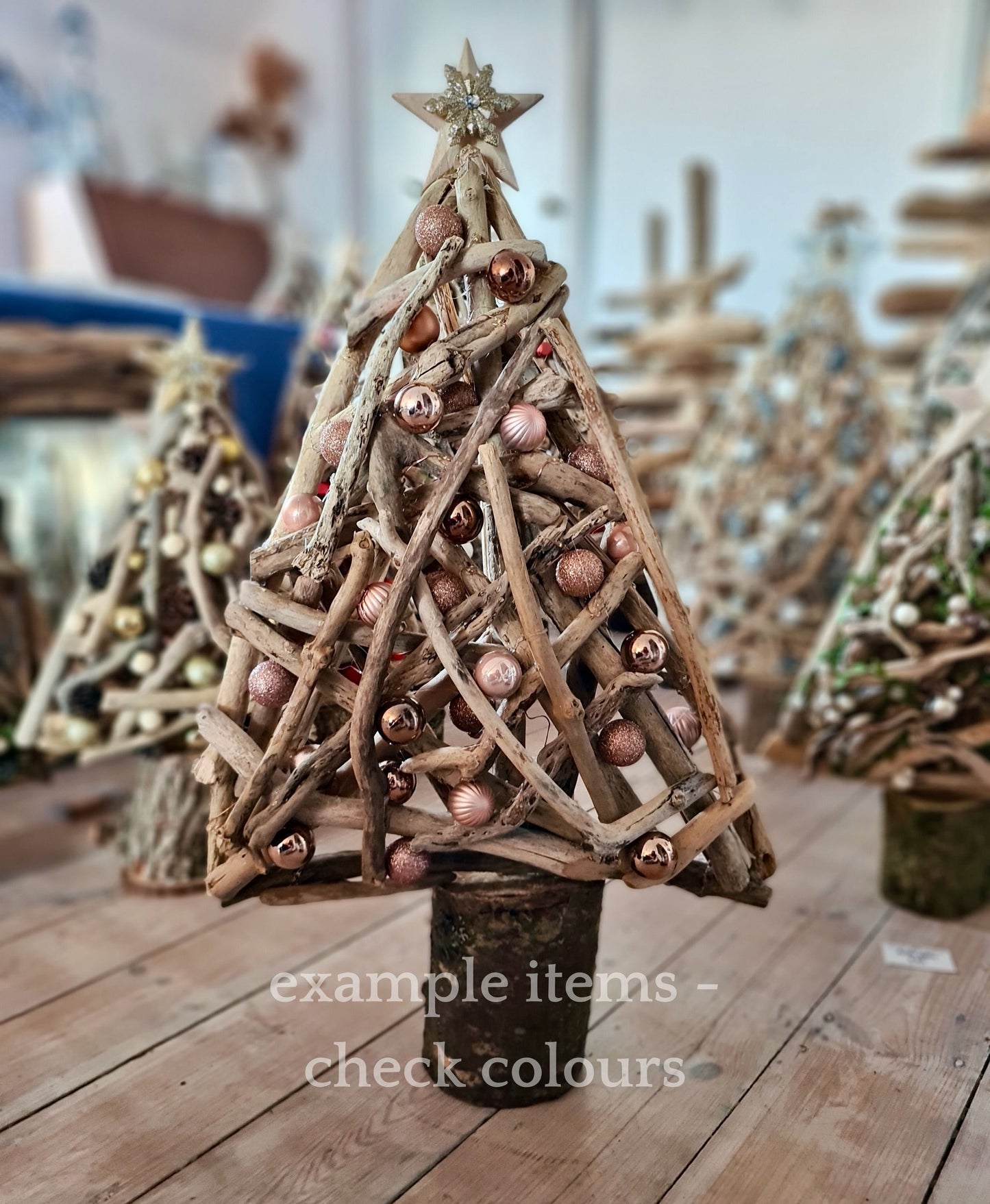 handmade driftwood Christmas tree with pink decorations