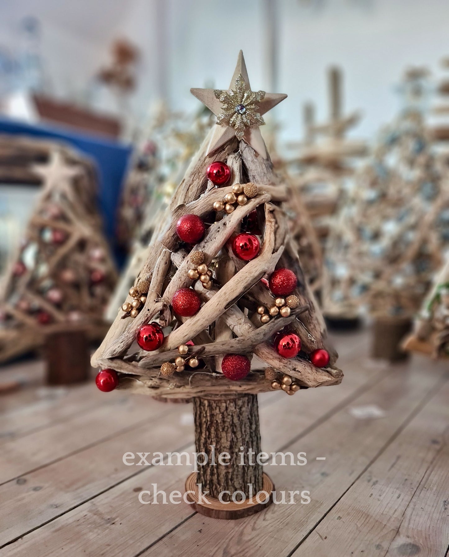 Handmade driftwood Christmas tree decorated with red baubles
