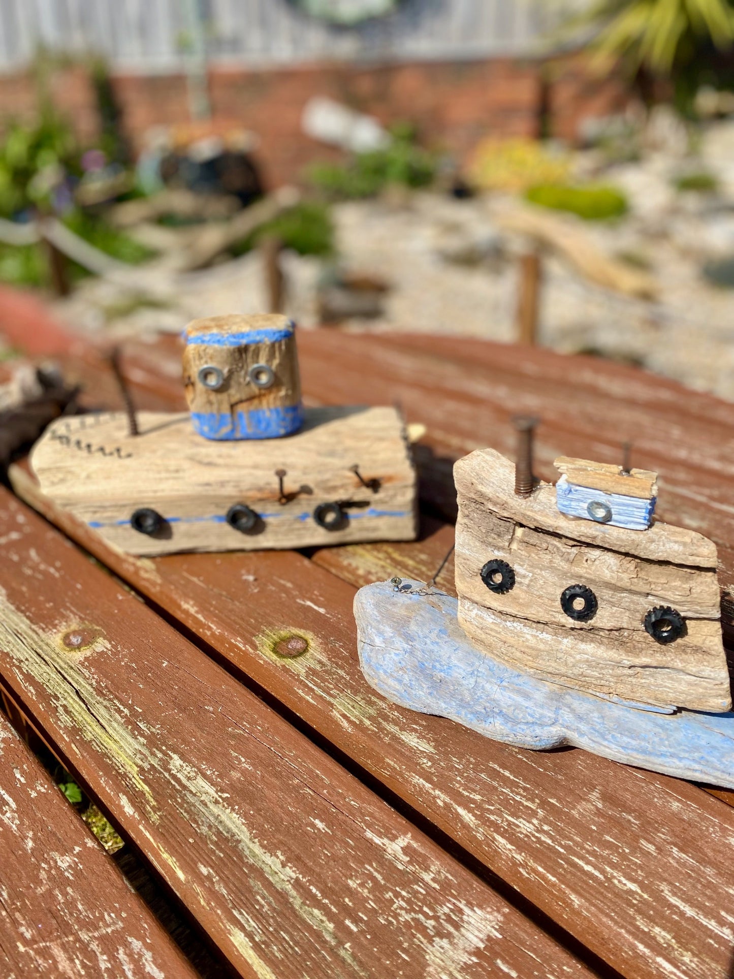 Two driftwood boats