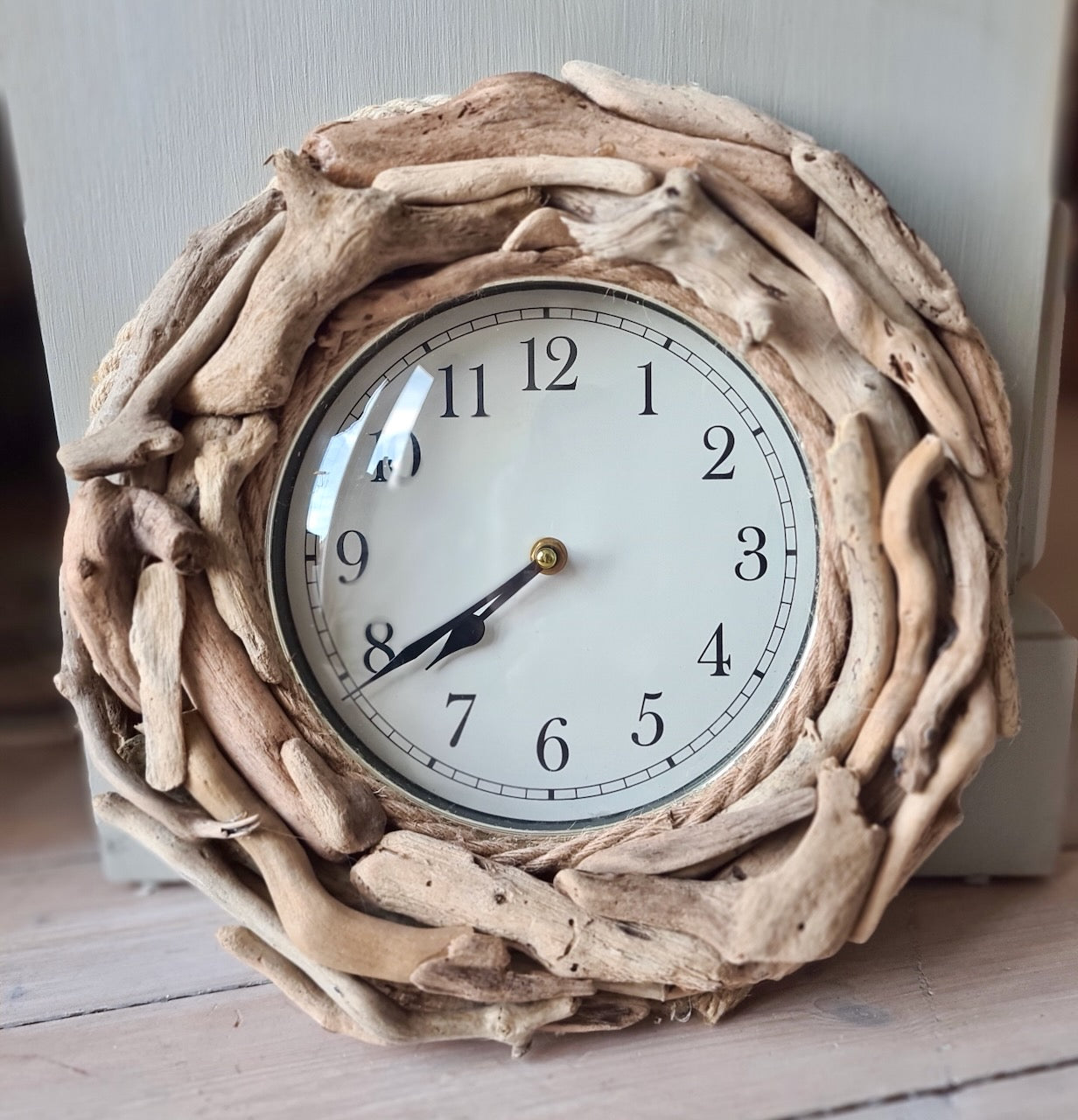 wall clock clad with driftwood