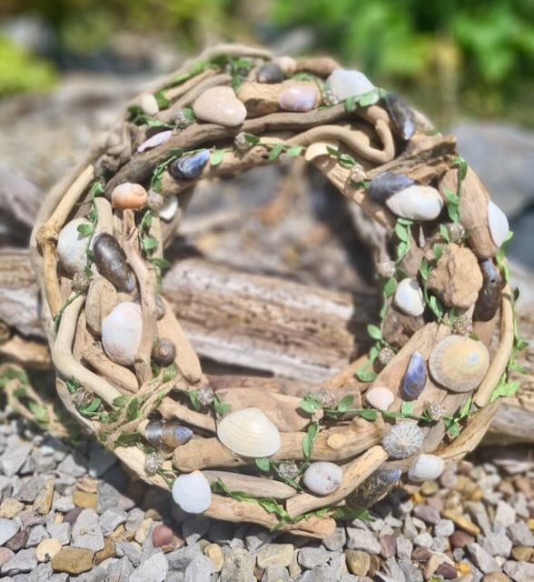 handmade driftwood wreath with shells