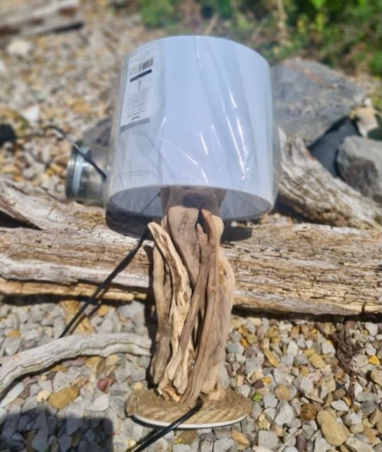 driftwood lamp clad in driftwood and rope